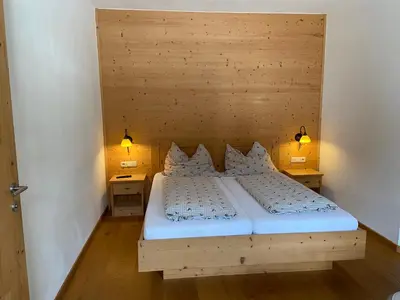 Ein Bett oder Betten in einem Zimmer der Unterkunft Landgasthof Kirchenwirt