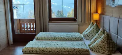 Ein Bett oder Betten in einem Zimmer der Unterkunft Apartment Schneeberger