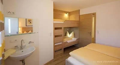 Ein Bett oder Betten in einem Zimmer der Unterkunft Apartment Schneeberger