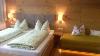 Ein Bett oder Betten in einem Zimmer der Unterkunft Apartment Schneeberger