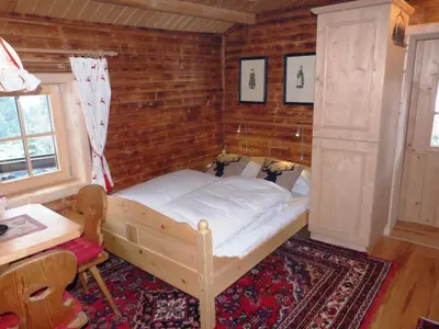 Ein Bett oder Betten in einem Zimmer der Unterkunft Sonnhuette