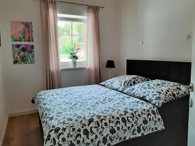 Ein Bett oder Betten in einem Zimmer der Unterkunft Ferienhaus Kaiserblick - FEWO1