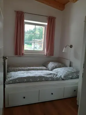 Ein Bett oder Betten in einem Zimmer der Unterkunft Ferienhaus Kaiserblick - FEWO1