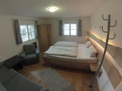 Ein Bett oder Betten in einem Zimmer der Unterkunft Ferienhaus Kaltenbrunn