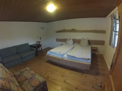 Ein Bett oder Betten in einem Zimmer der Unterkunft Ferienhaus Kaltenbrunn