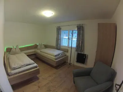 Ein Bett oder Betten in einem Zimmer der Unterkunft Ferienhaus Kaltenbrunn
