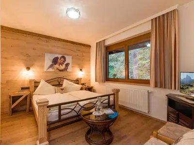 Ein Bett oder Betten in einem Zimmer der Unterkunft Hotel Gasthof Felsenkeller