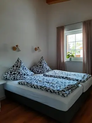 Ein Bett oder Betten in einem Zimmer der Unterkunft Ferienhaus Kaiserblick - FEWO2