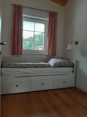 Ein Bett oder Betten in einem Zimmer der Unterkunft Ferienhaus Kaiserblick - FEWO2