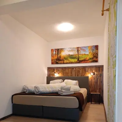 Ein Bett oder Betten in einem Zimmer der Unterkunft Ferienwohnung Heissl