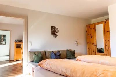 Ein Bett oder Betten in einem Zimmer der Unterkunft Gästehaus Wurm