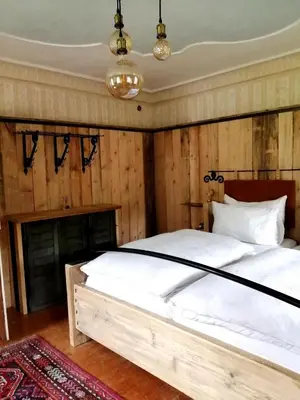 Ein Bett oder Betten in einem Zimmer der Unterkunft Bodenschmiede