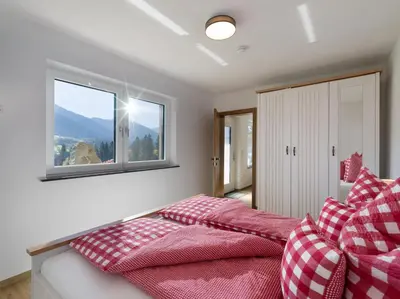 Ein Bett oder Betten in einem Zimmer der Unterkunft Apartment Heimatliebe