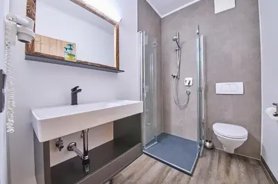 Ein Badezimmer in der Unterkunft Eibinghof BED & BREAKFAST & SWIM