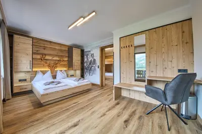 Ein Bett oder Betten in einem Zimmer der Unterkunft Eibinghof BED & BREAKFAST & SWIM