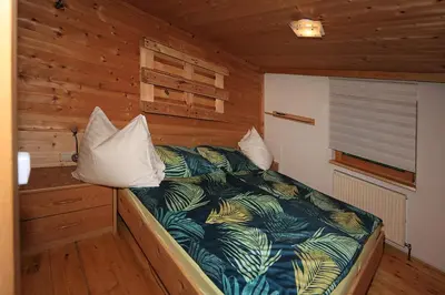 Ein Bett oder Betten in einem Zimmer der Unterkunft Kuanerhof Wohnung 2-4 Personen