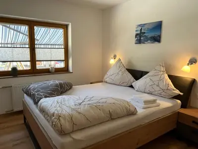 Ein Bett oder Betten in einem Zimmer der Unterkunft Apart Steffi