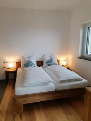 Ein Bett oder Betten in einem Zimmer der Unterkunft Ferienwohnungen Margreiter Birgit