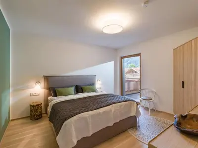 Ein Bett oder Betten in einem Zimmer der Unterkunft Apartment Hideaway - Stylisch, ruhig, Topausstattung, Infrarotsauna, Dachterrasse