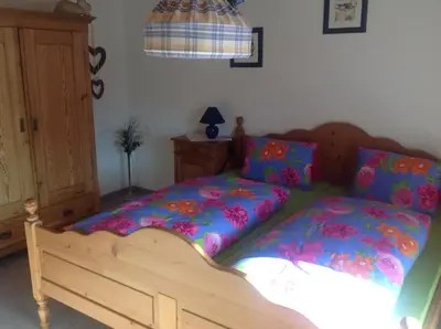 Ein Bett oder Betten in einem Zimmer der Unterkunft Freudenmacher