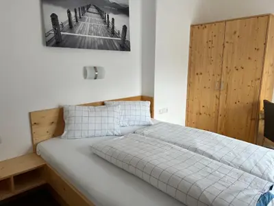 Ein Bett oder Betten in einem Zimmer der Unterkunft Ferienwohnung Martin Rahm