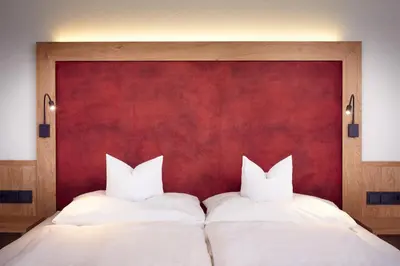 Ein Bett oder Betten in einem Zimmer der Unterkunft Hotel Gasthof Abelhof