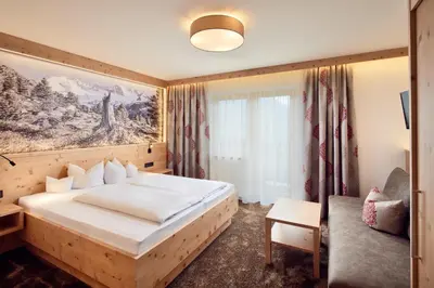Ein Bett oder Betten in einem Zimmer der Unterkunft Hotel Gasthof Abelhof