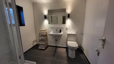 Ein Badezimmer in der Unterkunft Haus Grübl