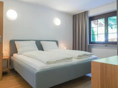 Ein Bett oder Betten in einem Zimmer der Unterkunft Haus Trudi