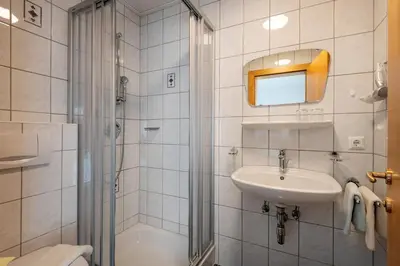 Ein Badezimmer in der Unterkunft Haus Hanser