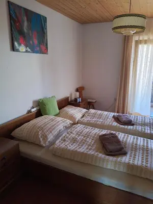 Ein Bett oder Betten in einem Zimmer der Unterkunft Haus Waldhuber