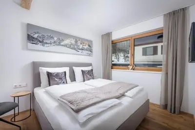 Ein Bett oder Betten in einem Zimmer der Unterkunft Apartment Streif LXL