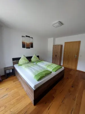 Ein Bett oder Betten in einem Zimmer der Unterkunft Ferienwohnung Julia Kröll