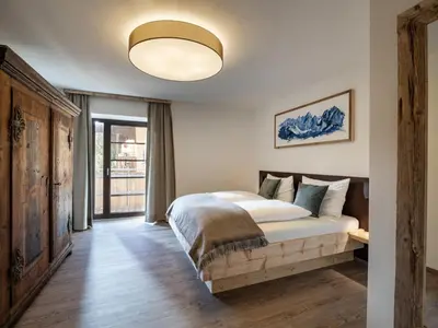 Ein Bett oder Betten in einem Zimmer der Unterkunft Alpine Homes - Hopfgarten