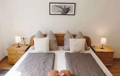 Ein Bett oder Betten in einem Zimmer der Unterkunft JOE's Appartement
