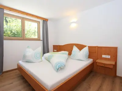 Ein Bett oder Betten in einem Zimmer der Unterkunft Apartment Bernadette by Interhome