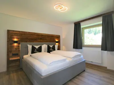 Ein Bett oder Betten in einem Zimmer der Unterkunft Apartment Heimatblick by Interhome