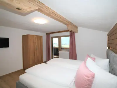 Ein Bett oder Betten in einem Zimmer der Unterkunft Apartment Panoramablick by Interhome