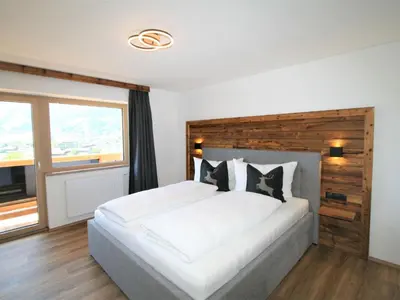 Ein Bett oder Betten in einem Zimmer der Unterkunft Apartment Geislerhof by Interhome