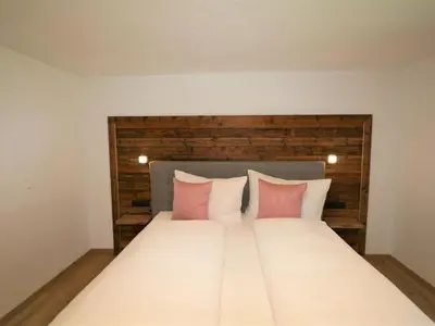 Ein Bett oder Betten in einem Zimmer der Unterkunft Apartment Geislerhof by Interhome