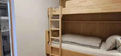 Ein Bett oder Betten in einem Zimmer der Unterkunft Ferienwohnungen Martlhof