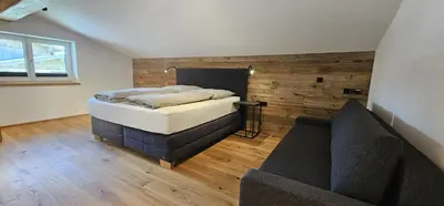 Ein Bett oder Betten in einem Zimmer der Unterkunft Ferienwohnungen Martlhof