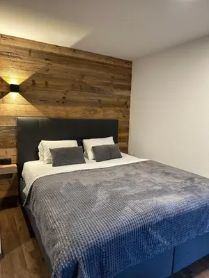 Ein Bett oder Betten in einem Zimmer der Unterkunft Appartments Das Franzal