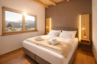 Ein Bett oder Betten in einem Zimmer der Unterkunft ViVaZILARE Loft - by AlpenLuxus Collection