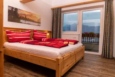 Ein Bett oder Betten in einem Zimmer der Unterkunft Ferienwohnungen Hinterstein