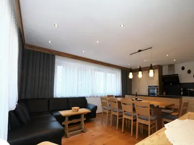 Ein Sitzbereich in der Unterkunft High-quality holiday apartment in Oberkrimml near waterfalls