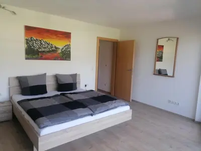 Ein Bett oder Betten in einem Zimmer der Unterkunft Haus Bergblick