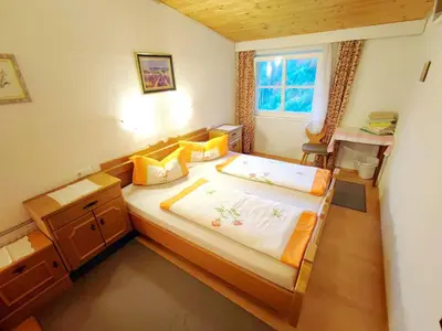 Ein Bett oder Betten in einem Zimmer der Unterkunft Group Holiday Home in Hippach with dreamy views