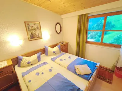 Ein Bett oder Betten in einem Zimmer der Unterkunft Group Holiday Home in Hippach with dreamy views