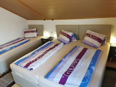 Ein Bett oder Betten in einem Zimmer der Unterkunft Apartment in Hippach with Mountain Views